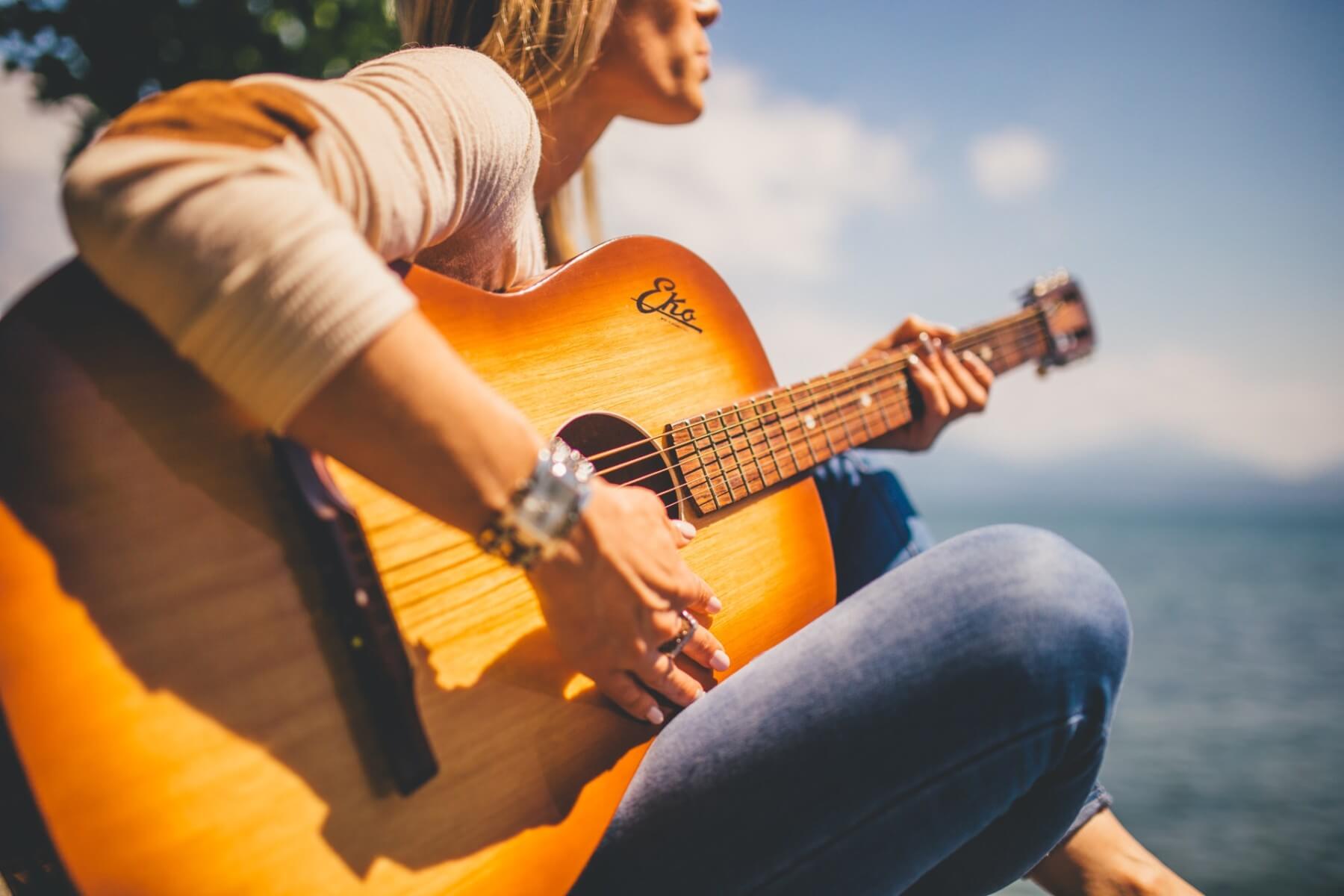 playing a guitar for inspiration