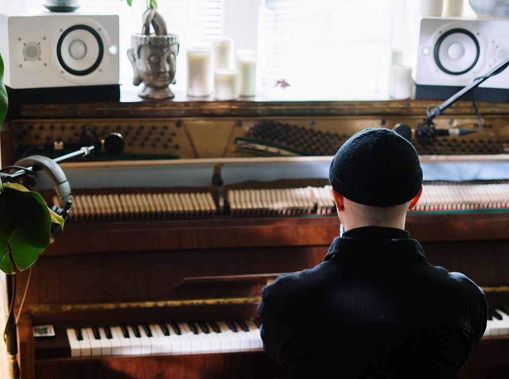 Musician playing a Piano in studio